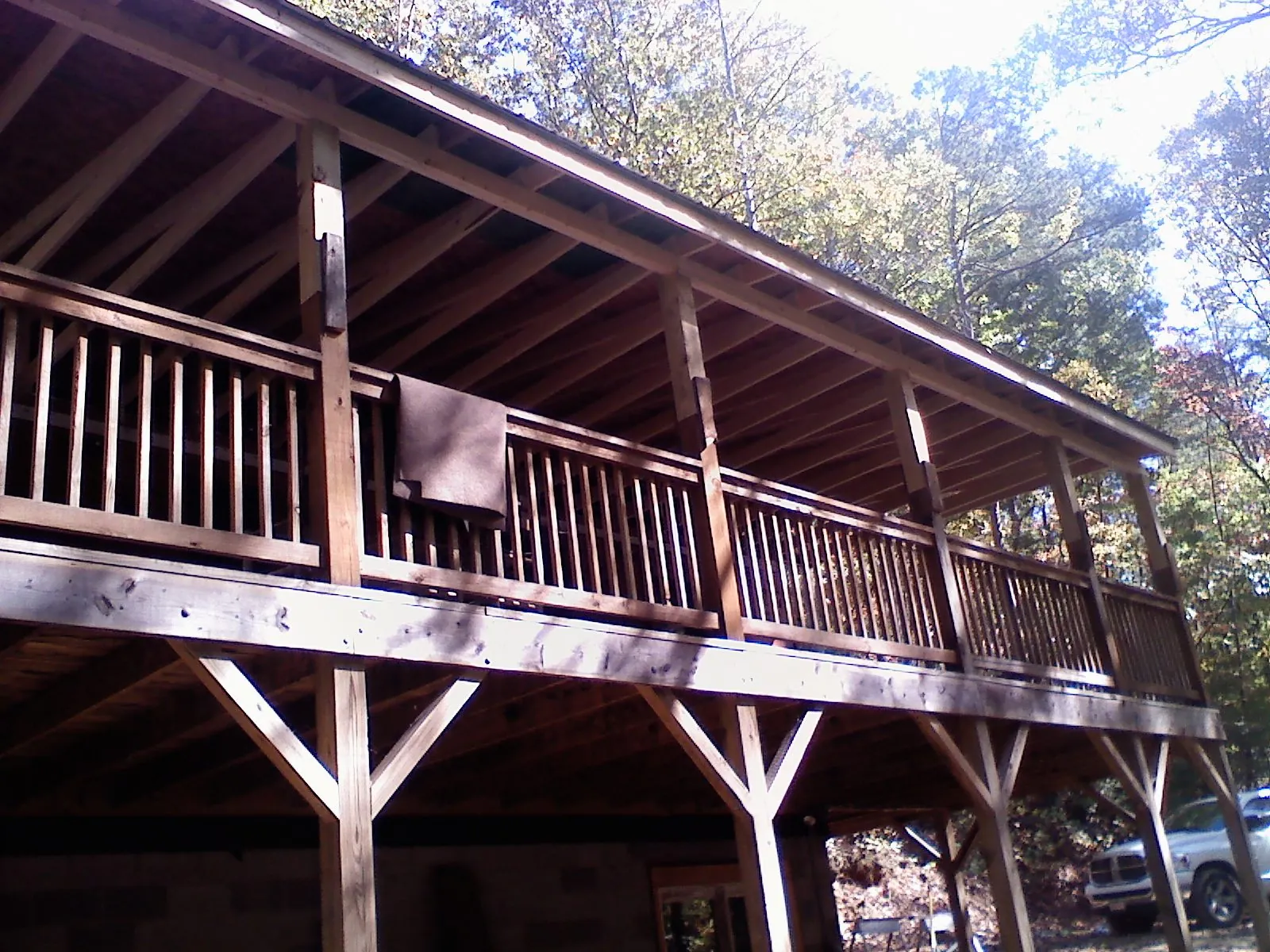 Timber framing under a new elevated porch and deck — Roof Leak Repair in Suches by Roofing Brothers